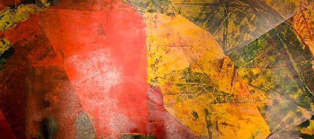 partial abstract painting with red yellow and green colors