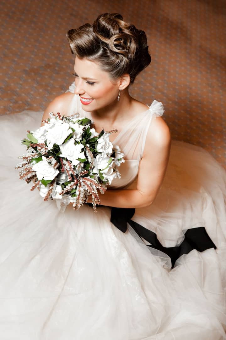 a bride holding flowers