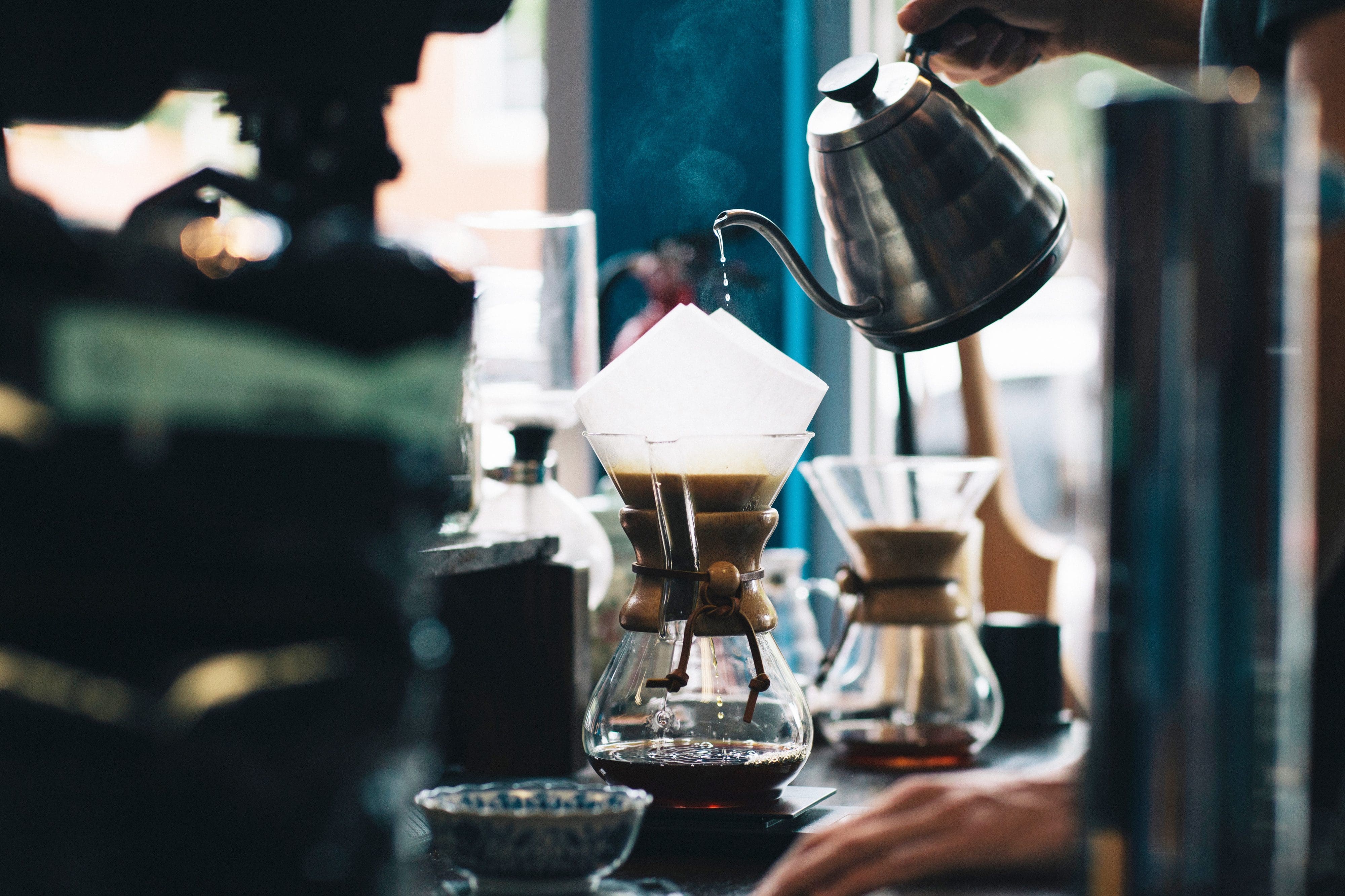 Coffee being brewed by a barista 