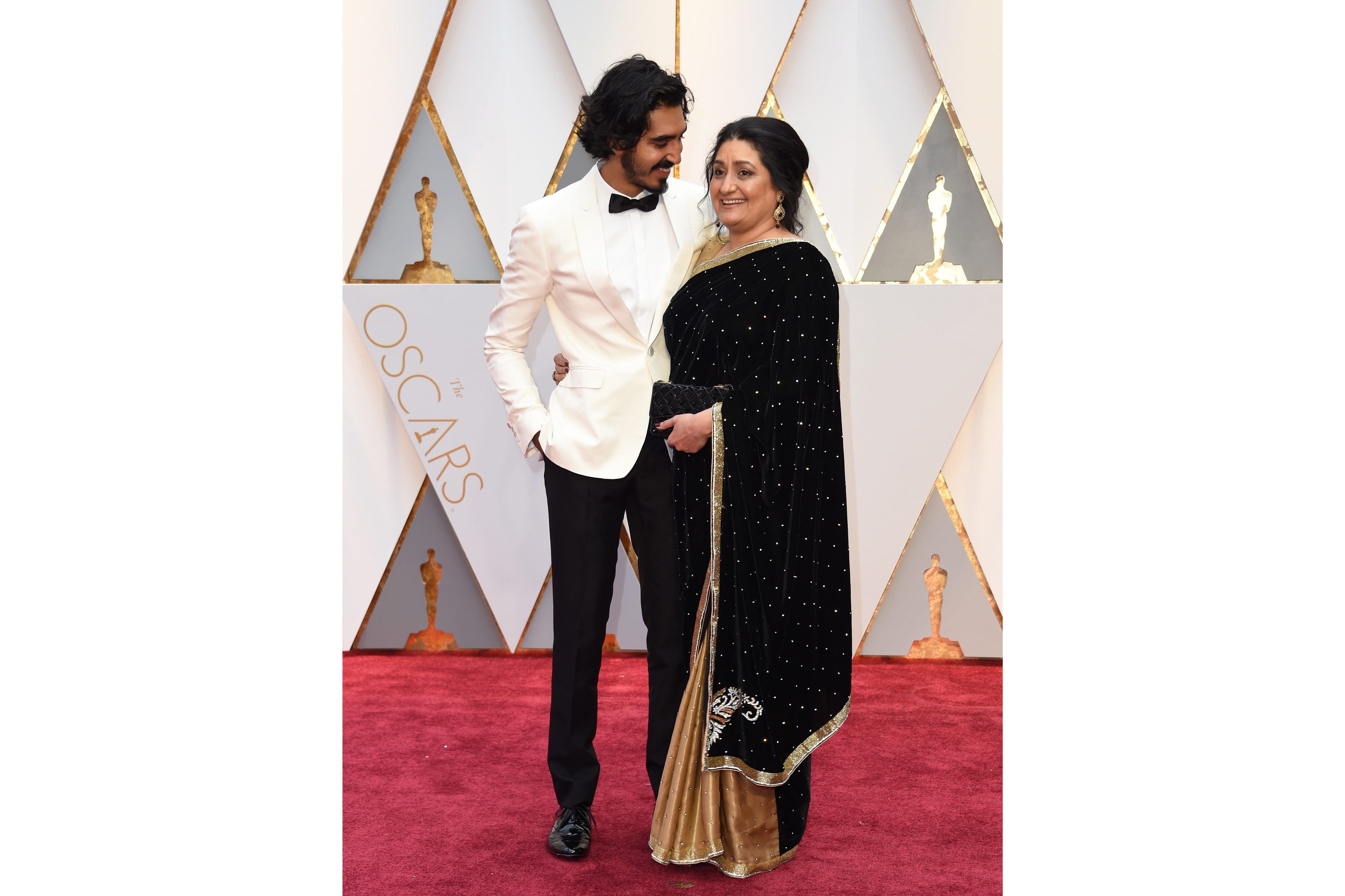 Dev with his mum on the Oscar's red carpet
