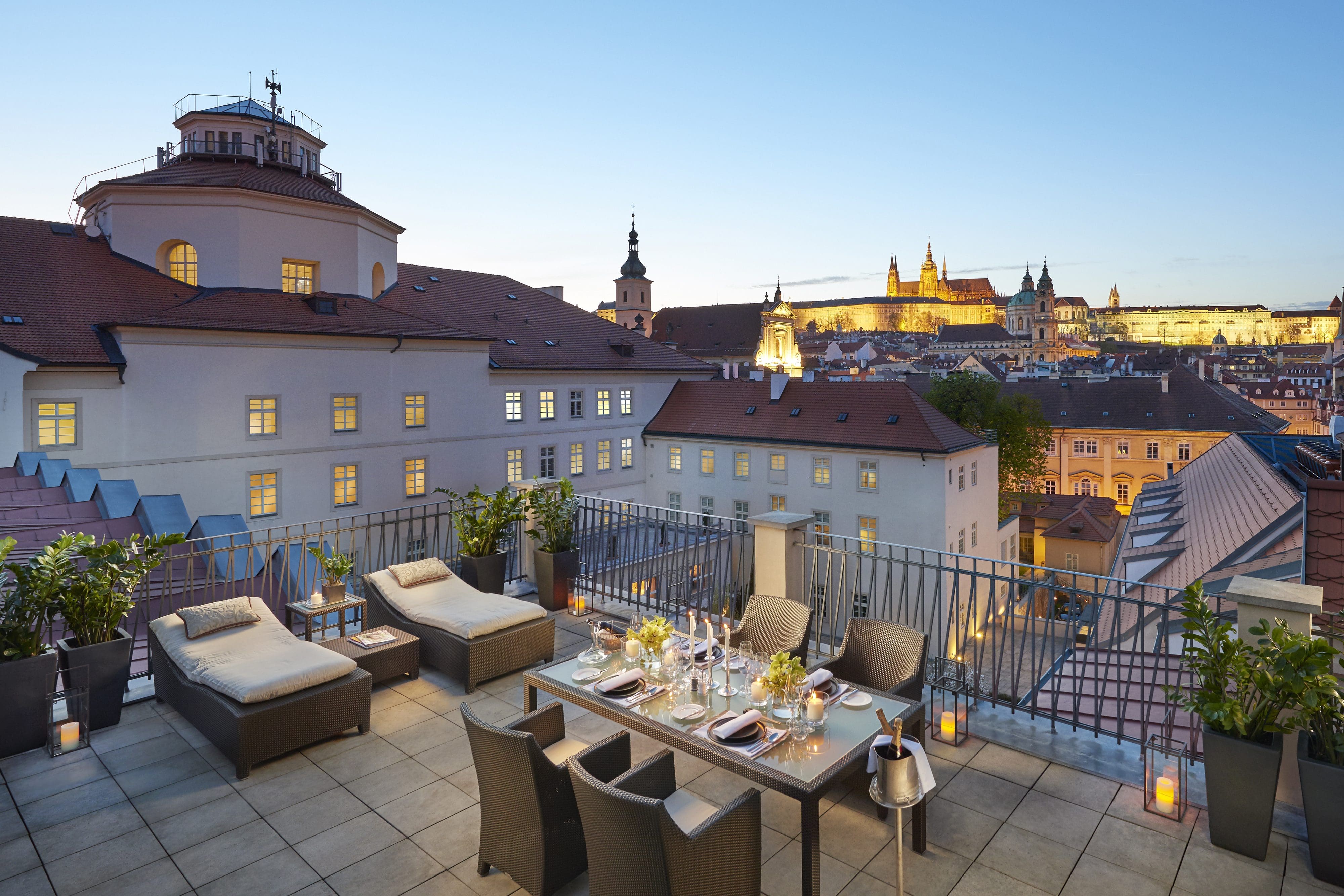 View of the city from the presidential suite terrace at MO Prague at dusk