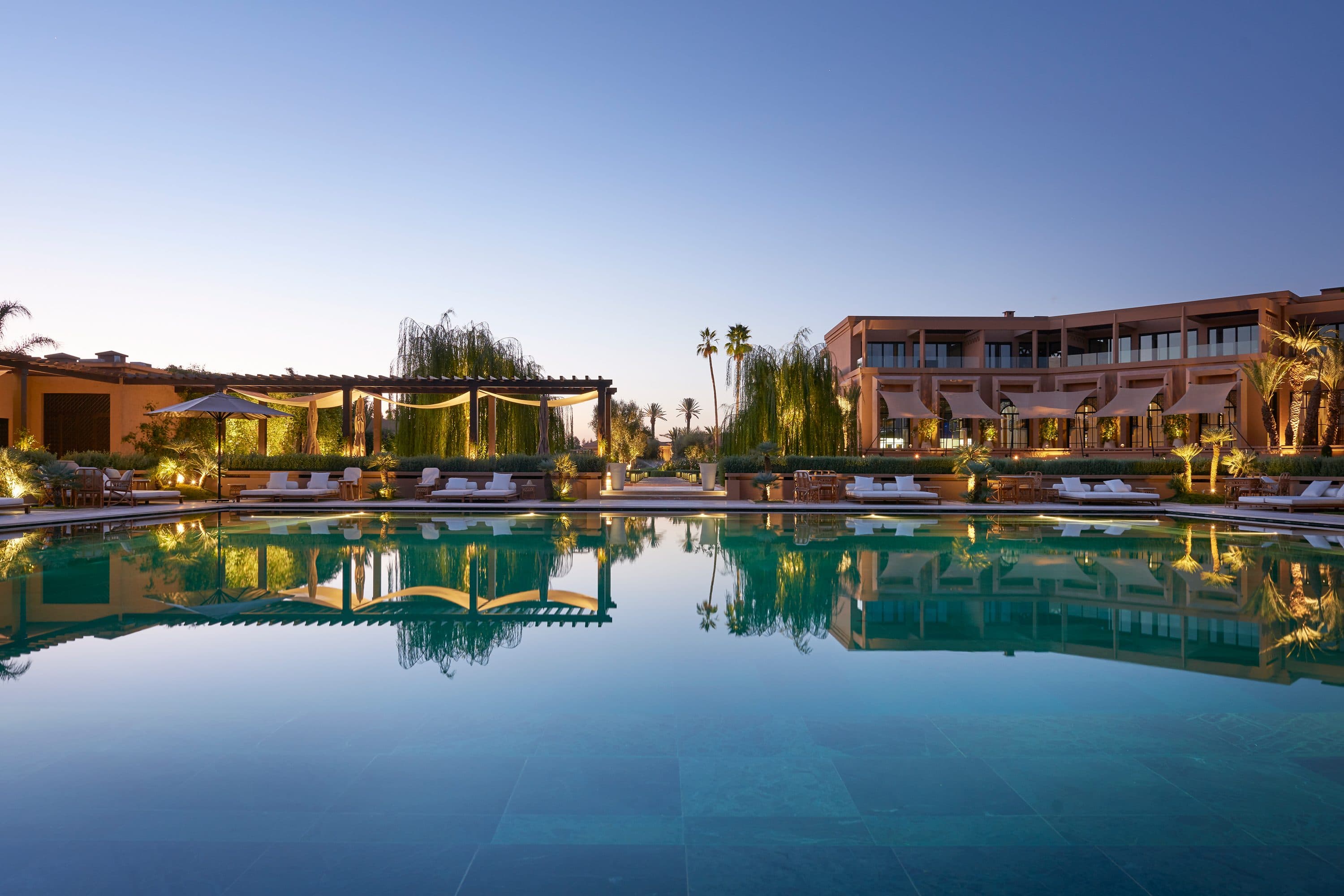 Sun loungers surround the pool at Mandarin Oriental, Marrakech
