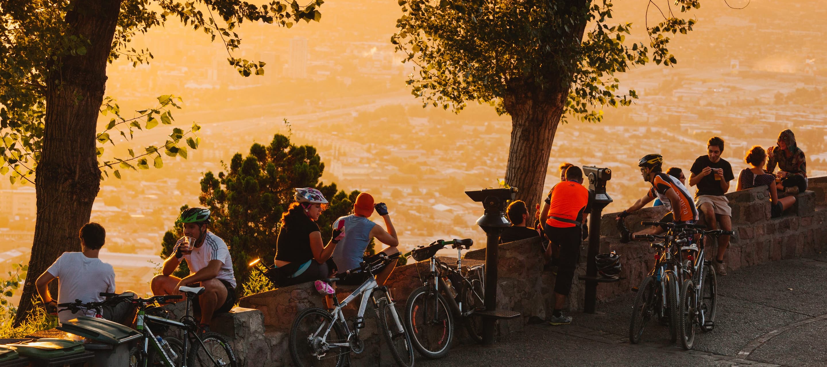 Bicycle riders enjoying views over Santiago