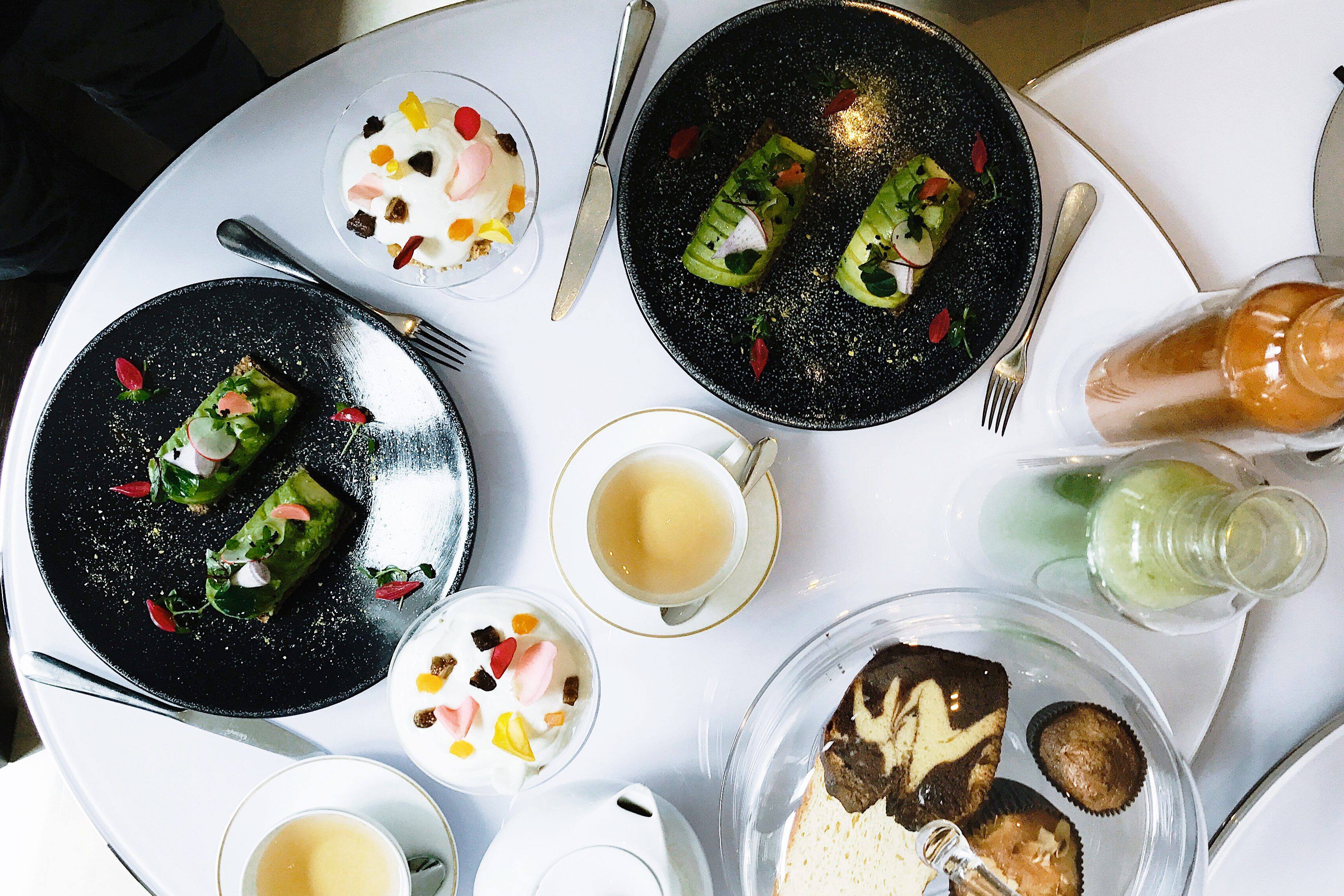 Artfully plated dishes on a table at L’Honoré 