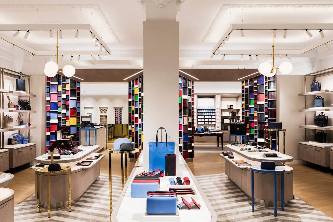 Colourful leather bags and accessories on display at Smythson, London