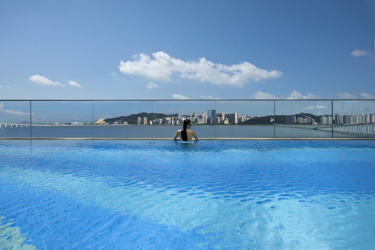 Woman in pool at Mandarin Oriental, Macau