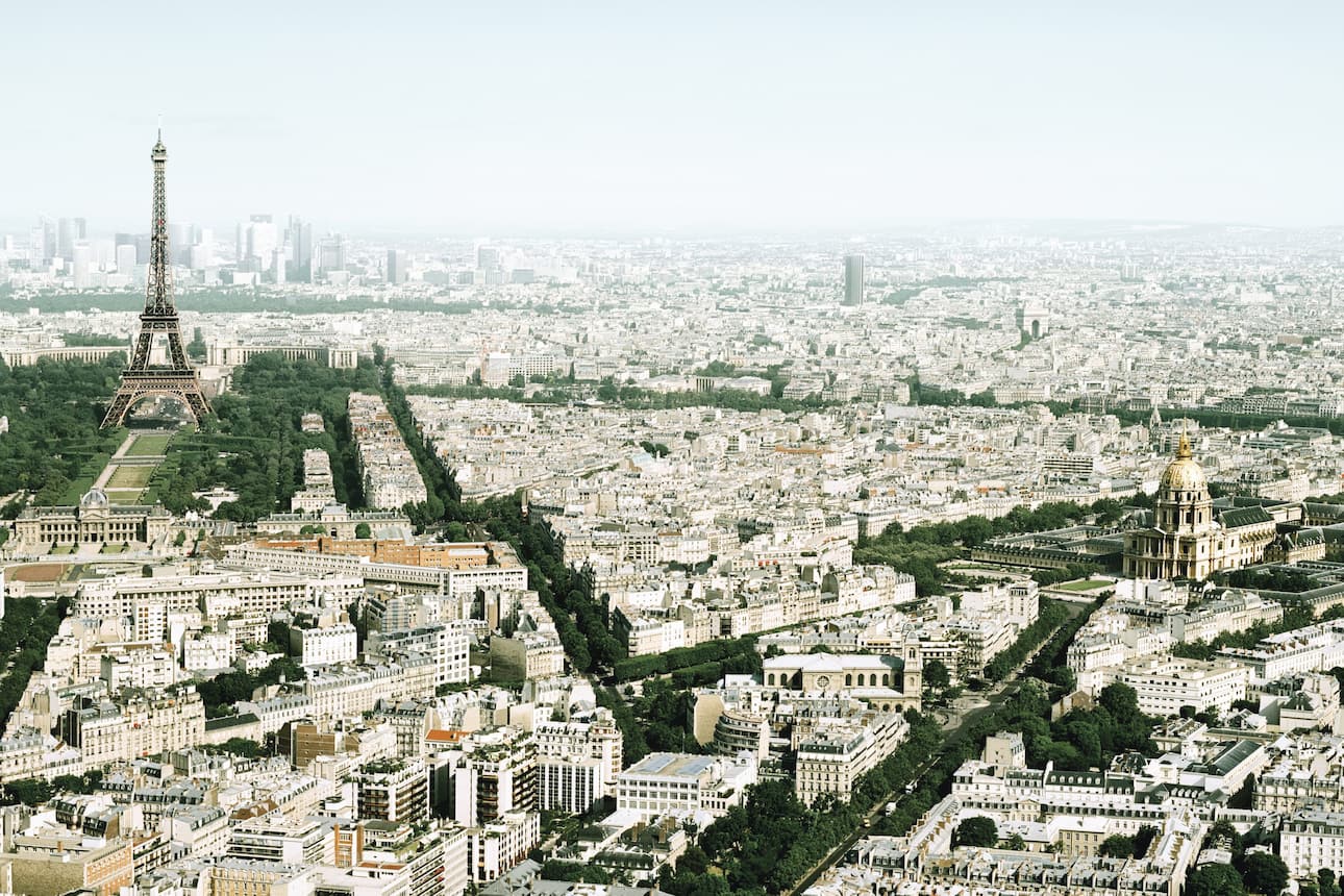 Bird's-eye view of Paris with the imposing Eiffel Tower in the background