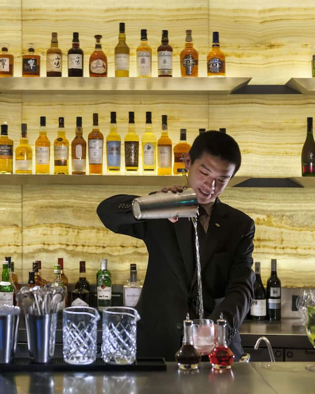 bartender at fifty 8 grill at Mandarin Oriental Pudong, Shanghai