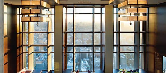 high level hotel lobby overlooking Tokyo buildings and skyline